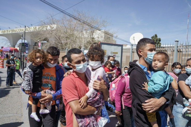 Central American migrants arrive in the Mexican city of Ciudad Juarez after their deportation from the US