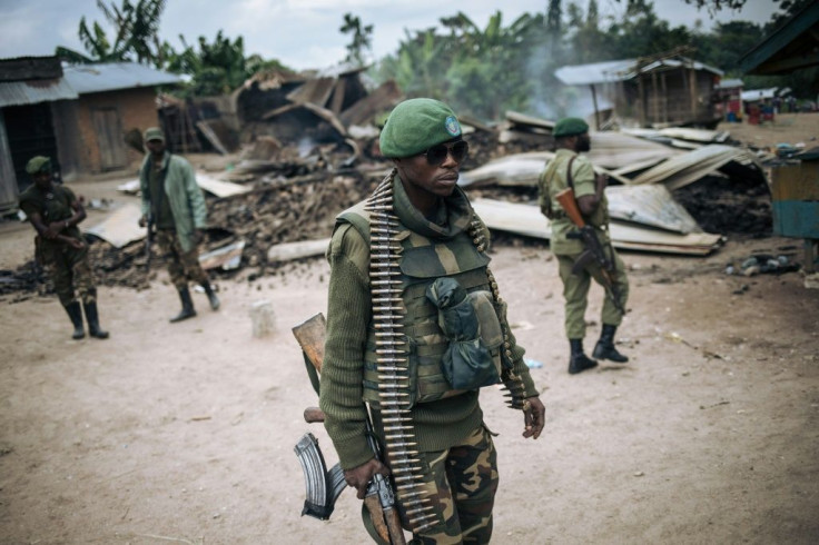 DR Congo troops on patrol in Manzalaho, a village near Beni, after an attack blamed on the ADF