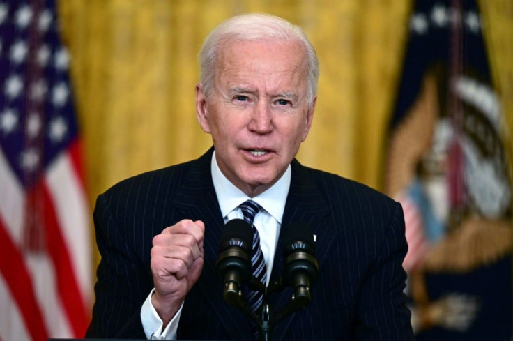 Joe Biden told Americans now was a time for 'optimism' but not 'relaxation' as the US prepared to administer its 100 millionth vaccine