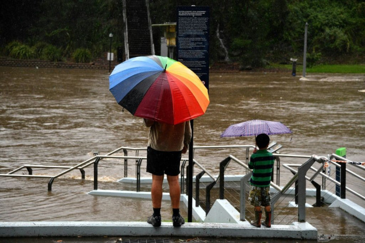 Forecasters warned the heavy rains were set to continue through Saturday 'potentially leading to life-threatening flash flooding'Â 