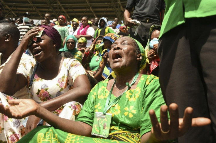Mourners lined the streets of Dar es Salaam to bid farewell to the late president