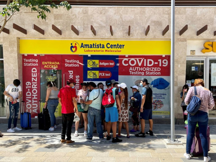 People queue for a Covid-19 test in Playa del Carmen on Mexico's Caribbean coast