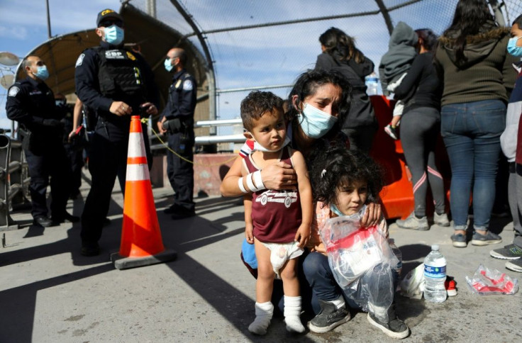 Dozens of Central American migrants are expelled from the United States by the Paso del Norte-Santa Fe international bridge, from El Paso, Texas, United States to Ciudad Juarez, state of Chihuahua, Mexico, on March 18, 2021