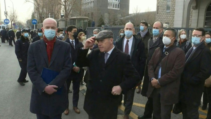 Foreign diplomats gather outside a Beijing court where the trial is set to begin for Michael Kovrig, the Canadian detained in China on espionage charges more than two years ago.