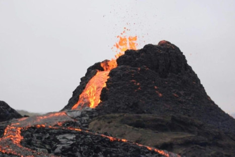 Visitors gather as Icelandic volcano subsides following eruption