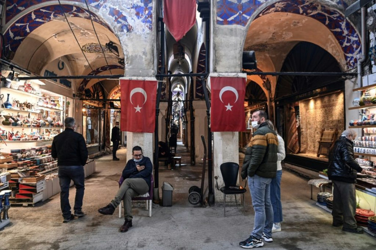Citizens on the streets of Istanbul worried about rising unemployment -- officially registered at 13.2 percent at the end of 2020 -- and their liras being able to buy less in stores.