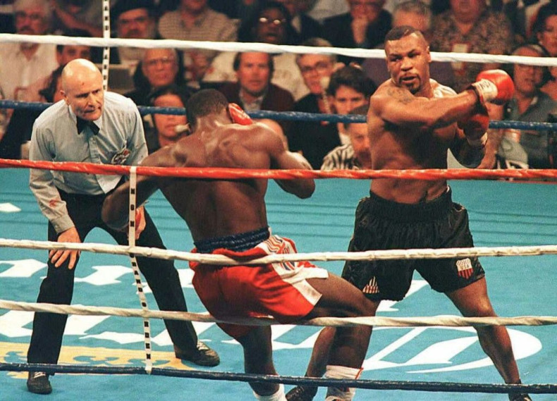 Mike Tyson (R) -- seen fighting in his prime in the mid-1990s -- has said Jamie Foxx will star in a new TV series about his life