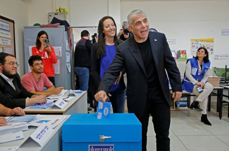 Lapid and his wife Lihi voted at a polling station in Tel Aviv during parliamentary elections in March last year