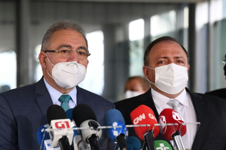 Doctor Marcelo Queiroga (L), was named Brazil's new health minister while Eduardo Pazuello (R) was sacked, but neither move has been made official yet