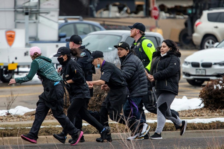 Shoppers being evacuated from a grocery store in Boulder, Colorado after a gunman opened fire on March 22, 2021 -- killing 10 people