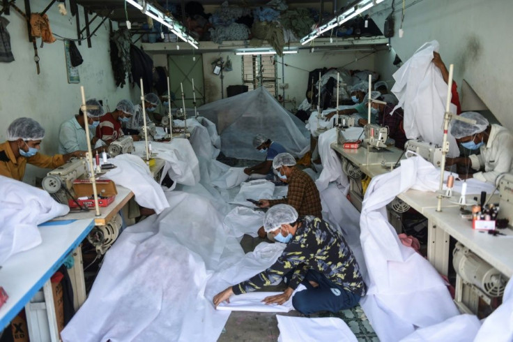 Workers in a factory for personal protective equipment (PPE) in Ahmedabad, India