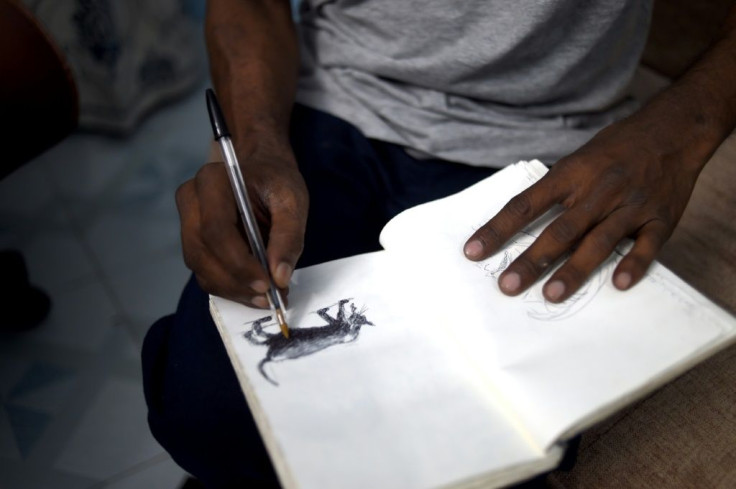 Ahmed Kabir Kishore believes his crime was a cartoon mocking a businessman with close government ties