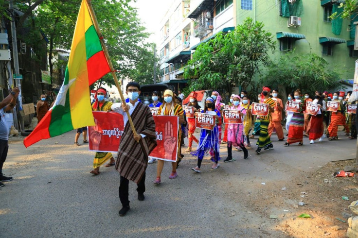 Protesters have continued calling for the military to step down, defying nighttime curfews to stage candlelight vigils for the dead, and taking to the streets early in dawn marches to avoid security forces