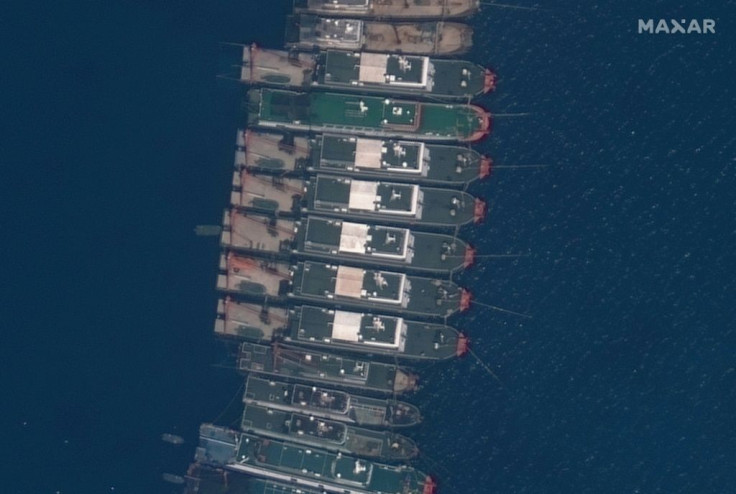 Manila has ordered Beijing to recall 183 boats from the boomerang-shaped reef around 320 kilometres (175 nautical miles) west of Palawan Island