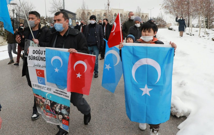 The protesters waved sky blue flags of Uyghur separatists' self-proclaimed state of East Turkestan as they gathered in Istanbul's historic old town