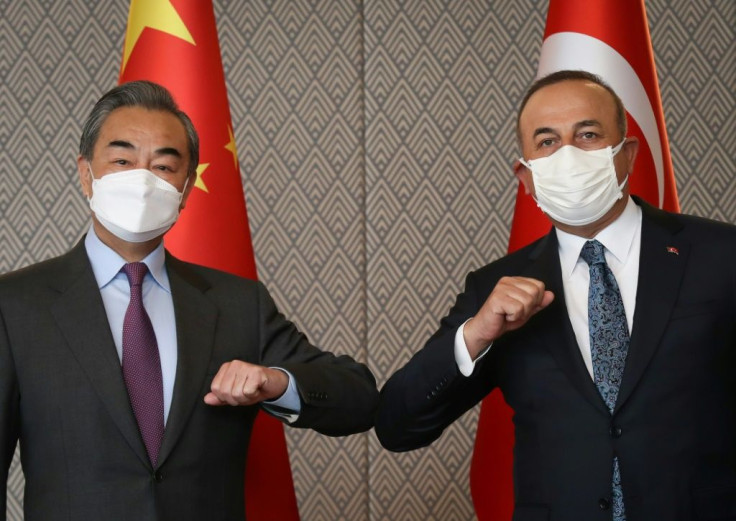 Cavusoglu (R) and Wang (L) met for talks in Ankara