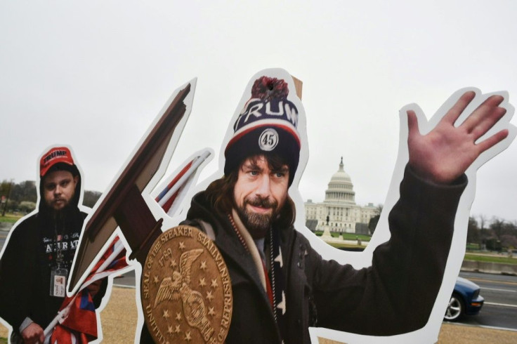 An effigy of Twitter CEO Jack Dorsey, dressed as a January 6, 2021, insurrectionist, is placed near the US Capitol ahead of a hearing on online disinformation