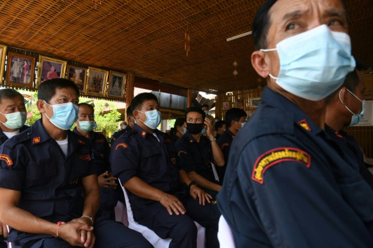 Village volunteer groups living along the Mekong river are providing around-the-clock surveillance of the border