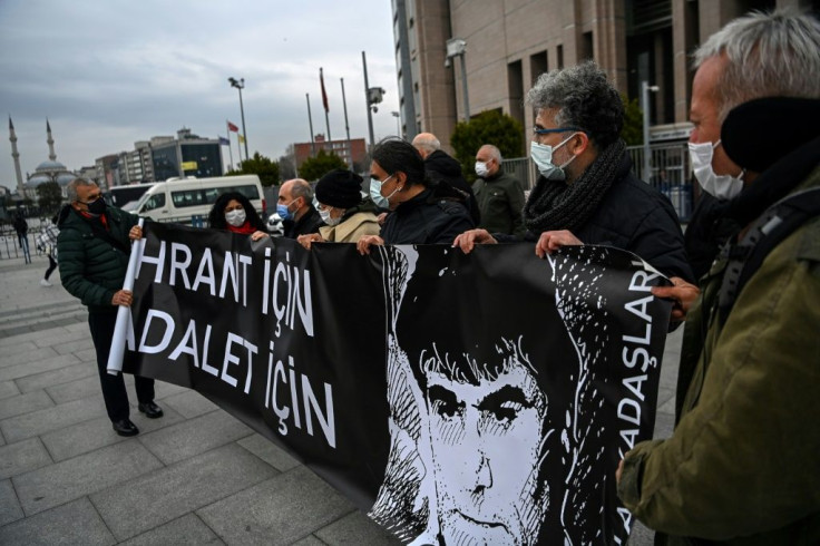 Demonstrators held banners reading "For Hrant, For Justice" in front of the Istanbul court