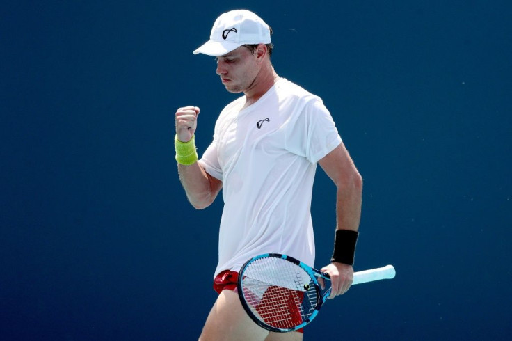 Australian James Duckworth celebrates a point in his second-round win over eighth-seeded David Goffin of Belgium in the Miami Open ATP and WTA hardcourt tennis tournament