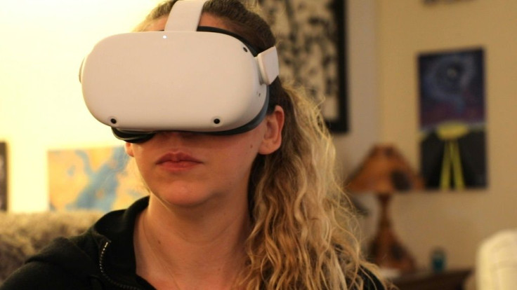 Amy Erdt, seen with Oculus headset, on March 19, says virtual reality can help people experience travel and new destinations even if they are in a pendemic lockdown