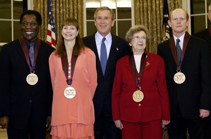 Beverly Cleary (2nd R) is pictured with president George W. Bush (center) in this November 12, 2003 photo, along with other recipients of the National Medal of Art (from L) blues musician Buddy Guy, dancer Suzanne Farrell and director Ron Howard