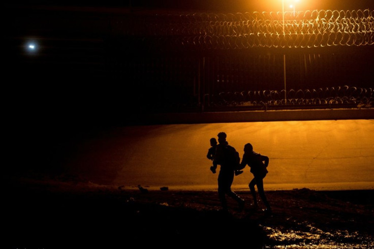 Undocumented migrants cross the Rio Grande river from the Mexican border city of Ciudad Juarez to El Paso, Texas