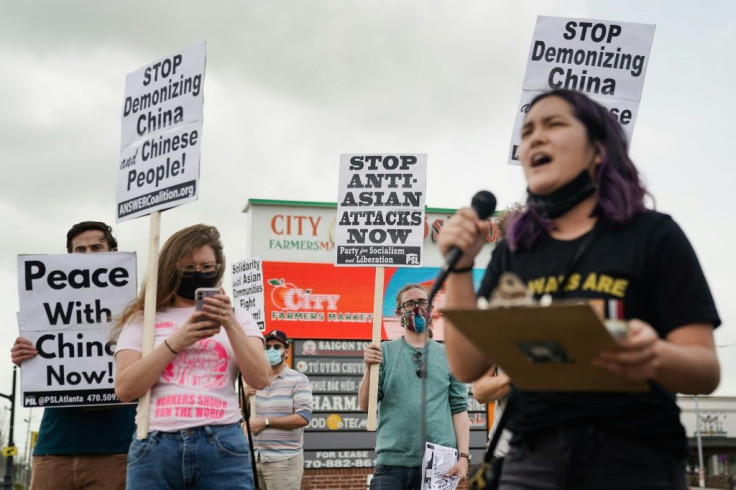 A woman speaks during an 'Anti Asian Hate' rally on March 27, 2021, in Chamblee, Georgia, the state where a gunman murdered eight people, including six women of Asian descent