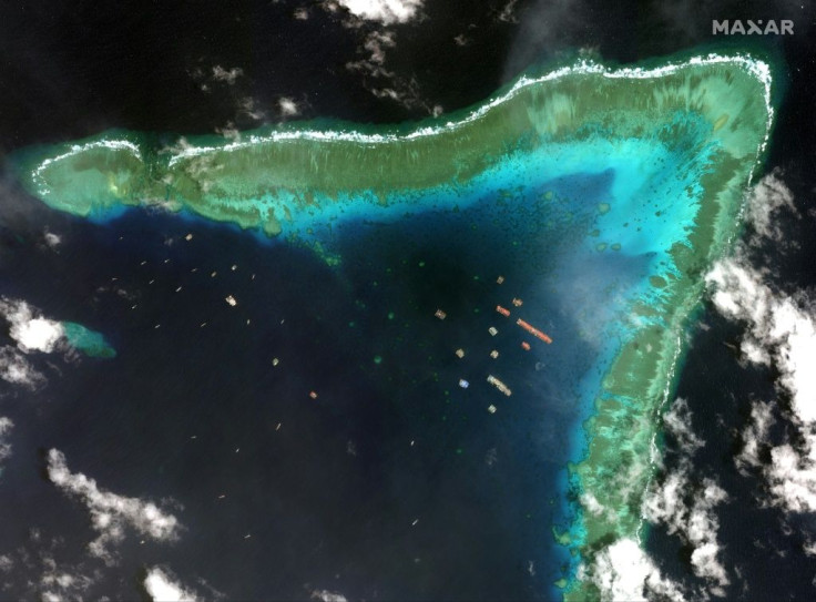 This satellite imagery taken on March 23 shows Chinese vessels anchored at the Whitsun Reef