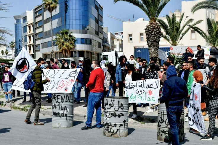 Activists demonstrate in Tunisia's port city of Sousse to demand the return to Italy of household waste exported illegaly to Tunisia