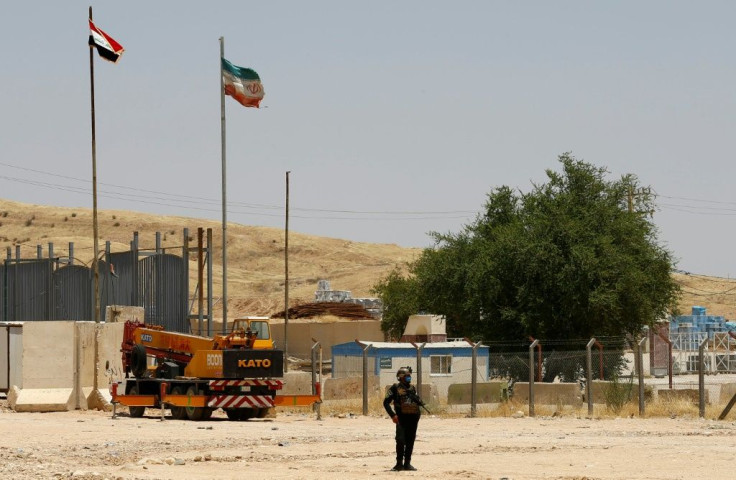 At Iraq's borders, a customs-evasion cartel is diverting billions of dollars away from state coffers, an AFP investigation has found