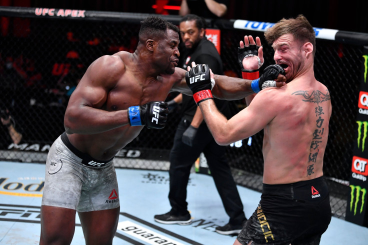 Francis Ngannou lands a punch on Stipe Miocic