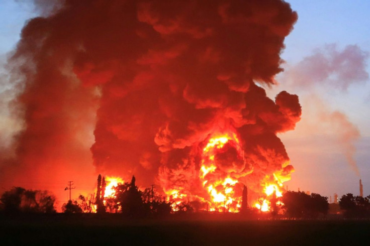 Firefighters are battling to contain the blaze at the refinery in West Java
