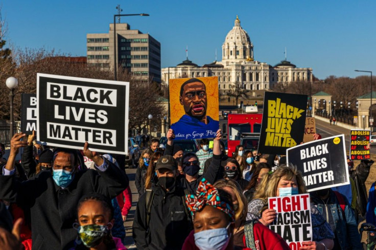Protesters attend a 'Justice for George Floyd' march in Saint Paul, Minnesota