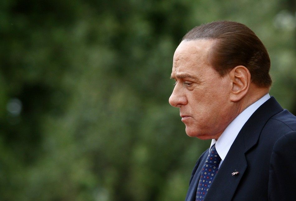 A defiant Berlusconi said on Wednesday he was not worried about an order to stand trial for paying for sex with an underage girl and abuse of power, and vowed to see out his term until 2013.