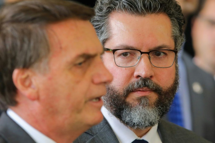 Brazilian Foreign Minister Ernesto Araujo (right) has been a key member of the so-called "ideological wing" of far-right President Jair Bolsonaro's administration
