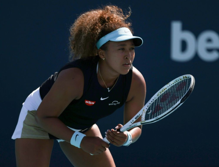 Japan's second-seeded Naomi Osaka advanced to the WTA Miami Open quarter-finals by defeating Elise Mertens of Belgium on Monday
