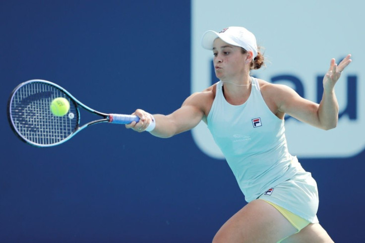 Ashleigh Barty of Australia returns to Aryna Sabalenka of Belarus in her quarter-final victory at the Miami Open on Tuesday