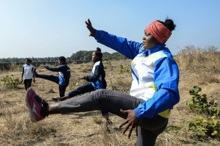 Shahnaz Lobi (R) jumped at the chance to pursue a sporting career after watching her labourer father struggle to feed his family