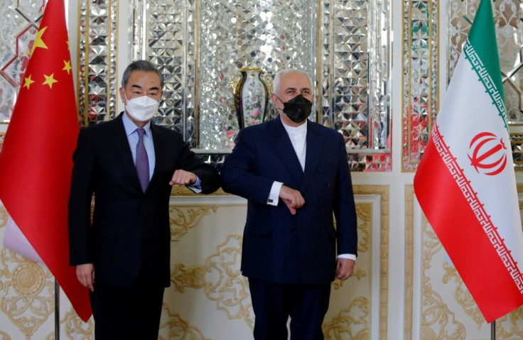 China has sought to shore up ties with old friends, on Saturday signing a 25-year strategic and commercial cooperation pact with Iran