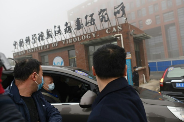 Members of the World Health Organization (WHO) team investigating the origins of the COVID-19 coronavirus visit the Wuhan Institute of Virology in Wuhan on February 3, 2021