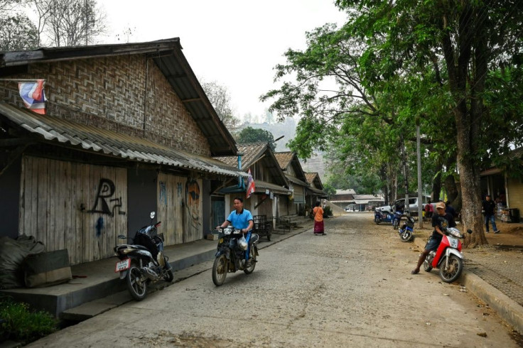 Some 50 Myanmar refugees who fled air strikes to neighbouring Thailand "voluntarily" returned across the border