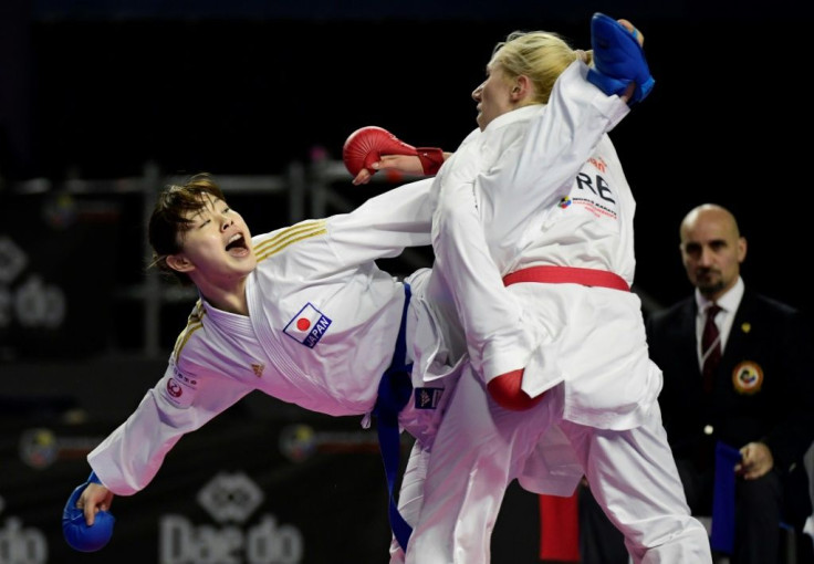 Japanese karateka Ayumi Uekusa (L) will compete in the women's over-61-kilogram kumite category as karate makes its Olympic debut this summer