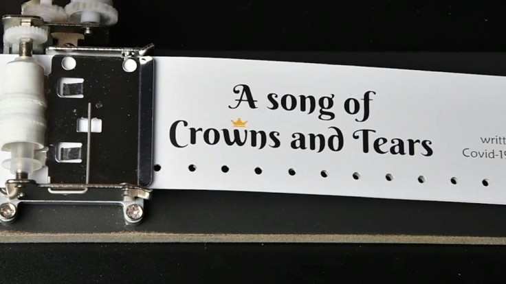 Using a small music box, a Swiss journalist tells the story of his country's struggles with the Covid-19 pandemic