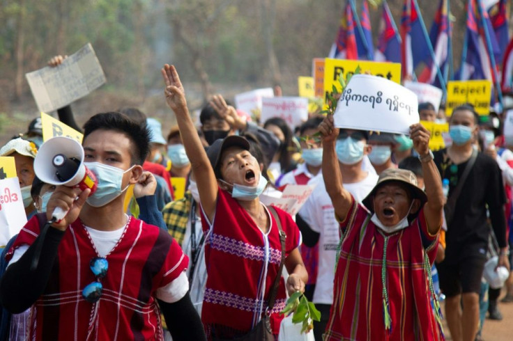 Ethnic Karen people take part in an anti-military coup demonstration in Hlaingbwe township, in eastern Myanmar's Karen state