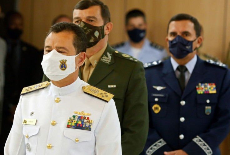 Brazil's new Navy commander Admiral Almir Garnier (L), Army commander General Paulo Sergio Nogueira de Oliveira (2-L) and new Air Force commander Brigadier Carlos Almeida Baptista Jr (R) attend their presentation ceremony