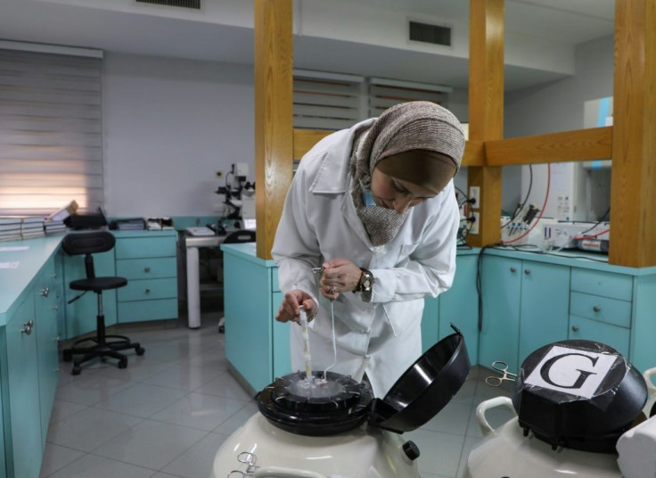 Palestinian doctor Ghosson Badran works at the Razan Center fertility clinic, where prisoners' wives are treated for free