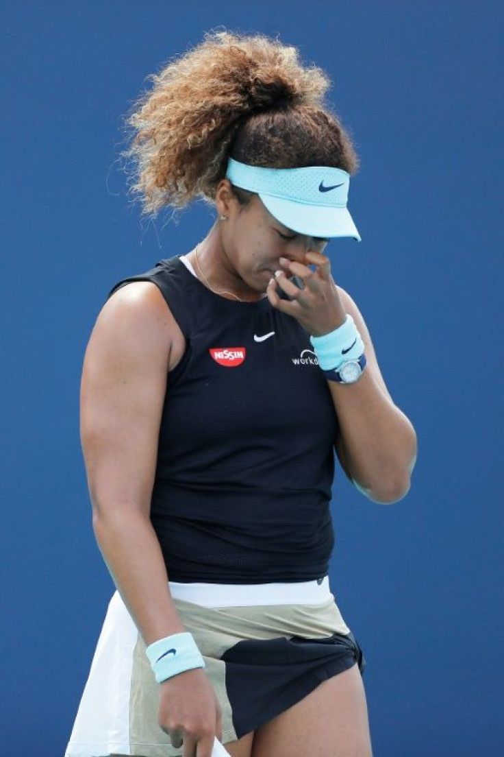 Naomi Osaka of Japan reacts during her quarter-final loss to Greece's Maria Sakkari in the ATP and WTA Miami Open
