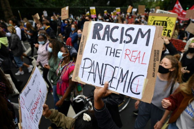 The report said while prejudice persists in Britain, the country is not "institutionally racist"