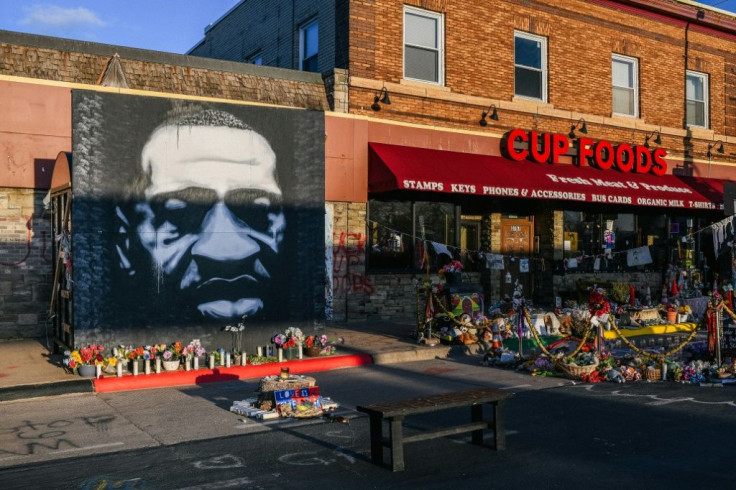 A mural and memorial to George Floyd at the Minneapolis intersection where he died